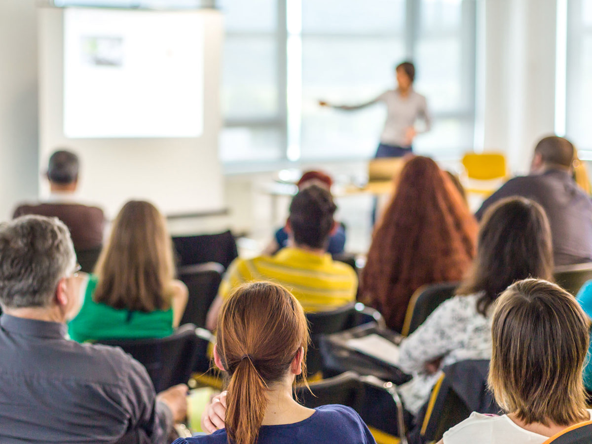training back of class pov blurred background