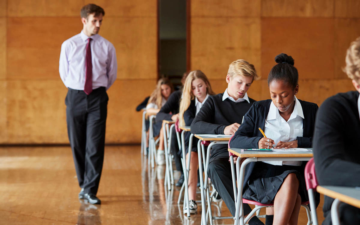 school-environment someone walking around during exam conditions 