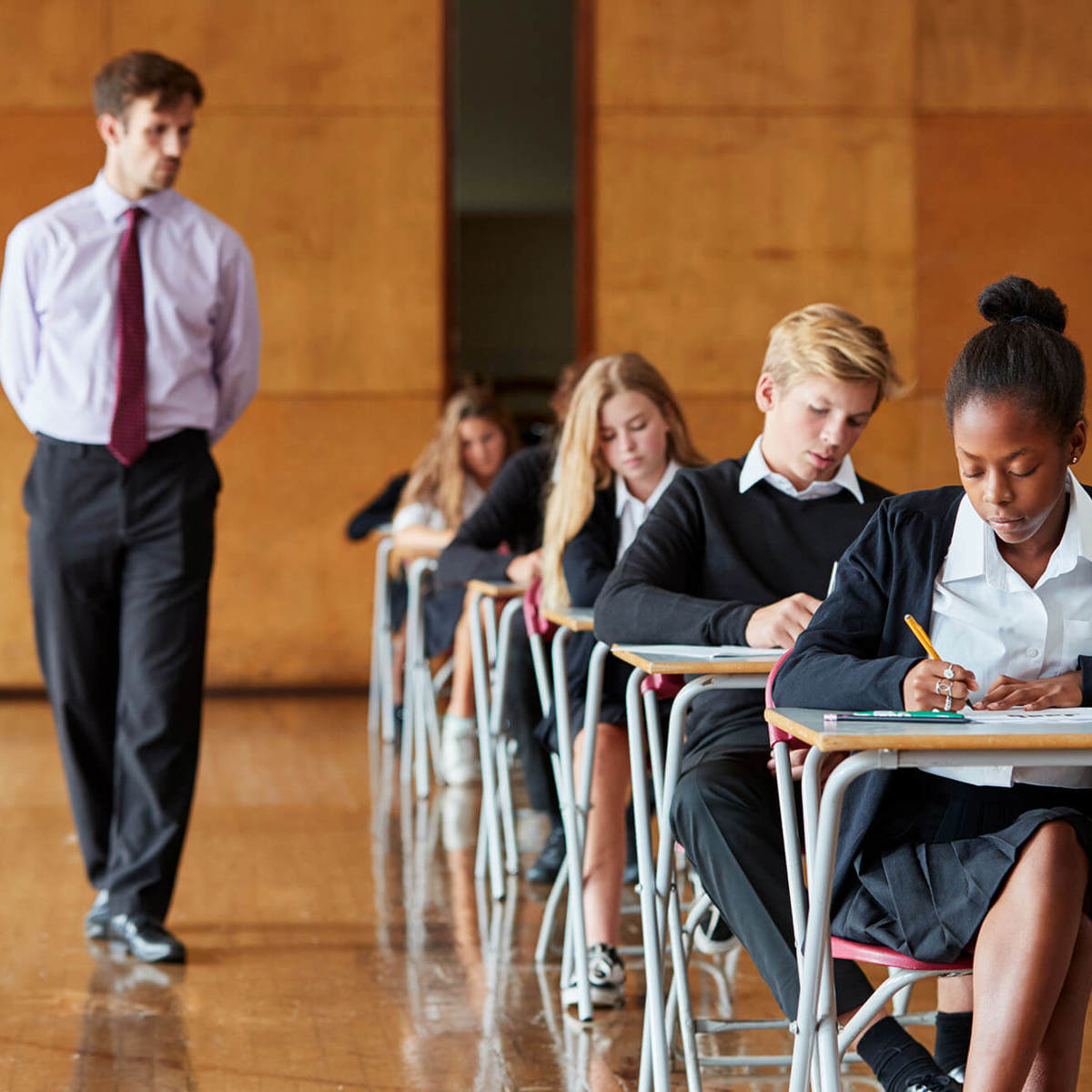 school-environment someone walking around during exam conditions 