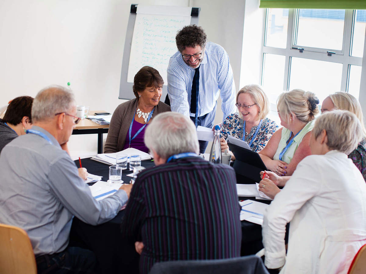 training paul presenting to group of people