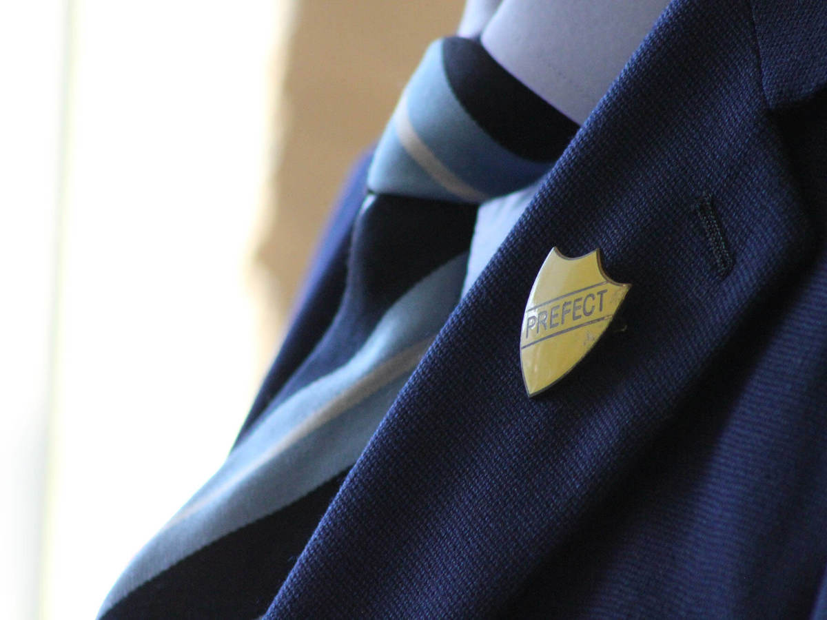 Pupils-learning close up of a prefects shirt and tie