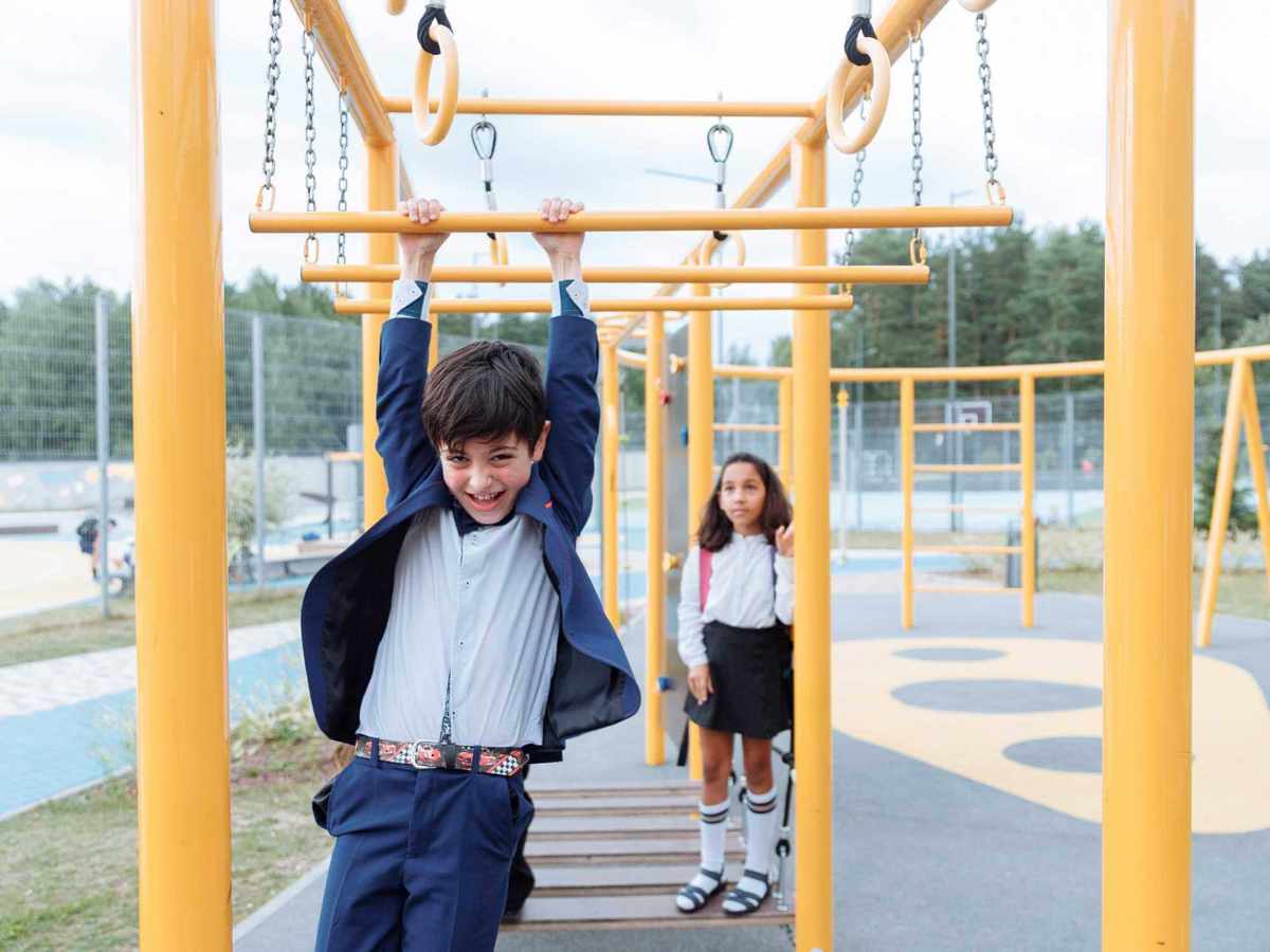 school-environment pupil using play equipment