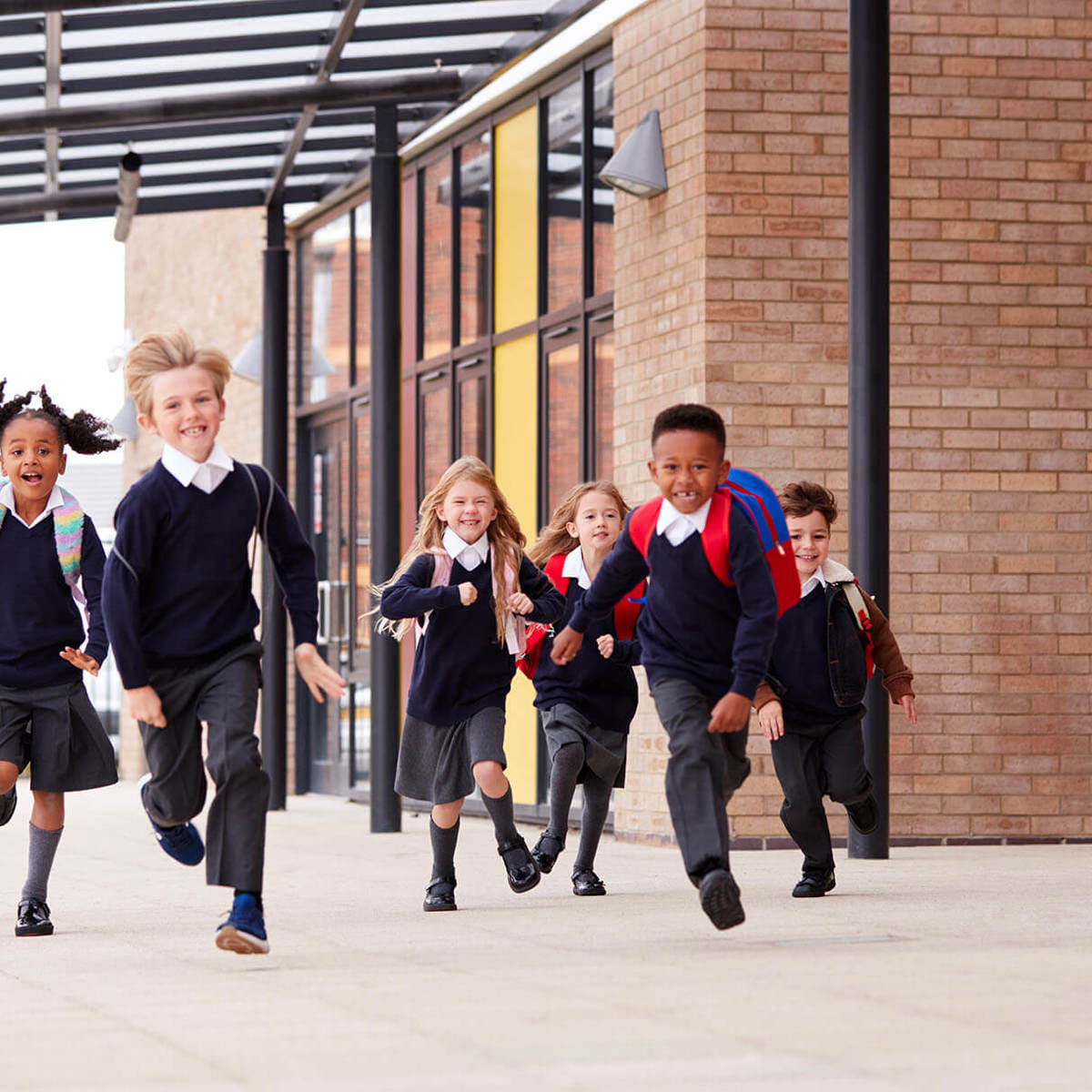 school-environment group of pupils running