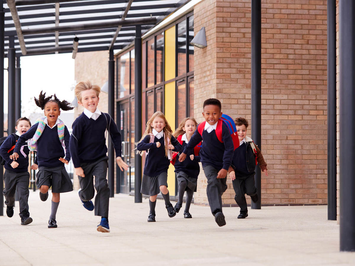 school-environment group of pupils running