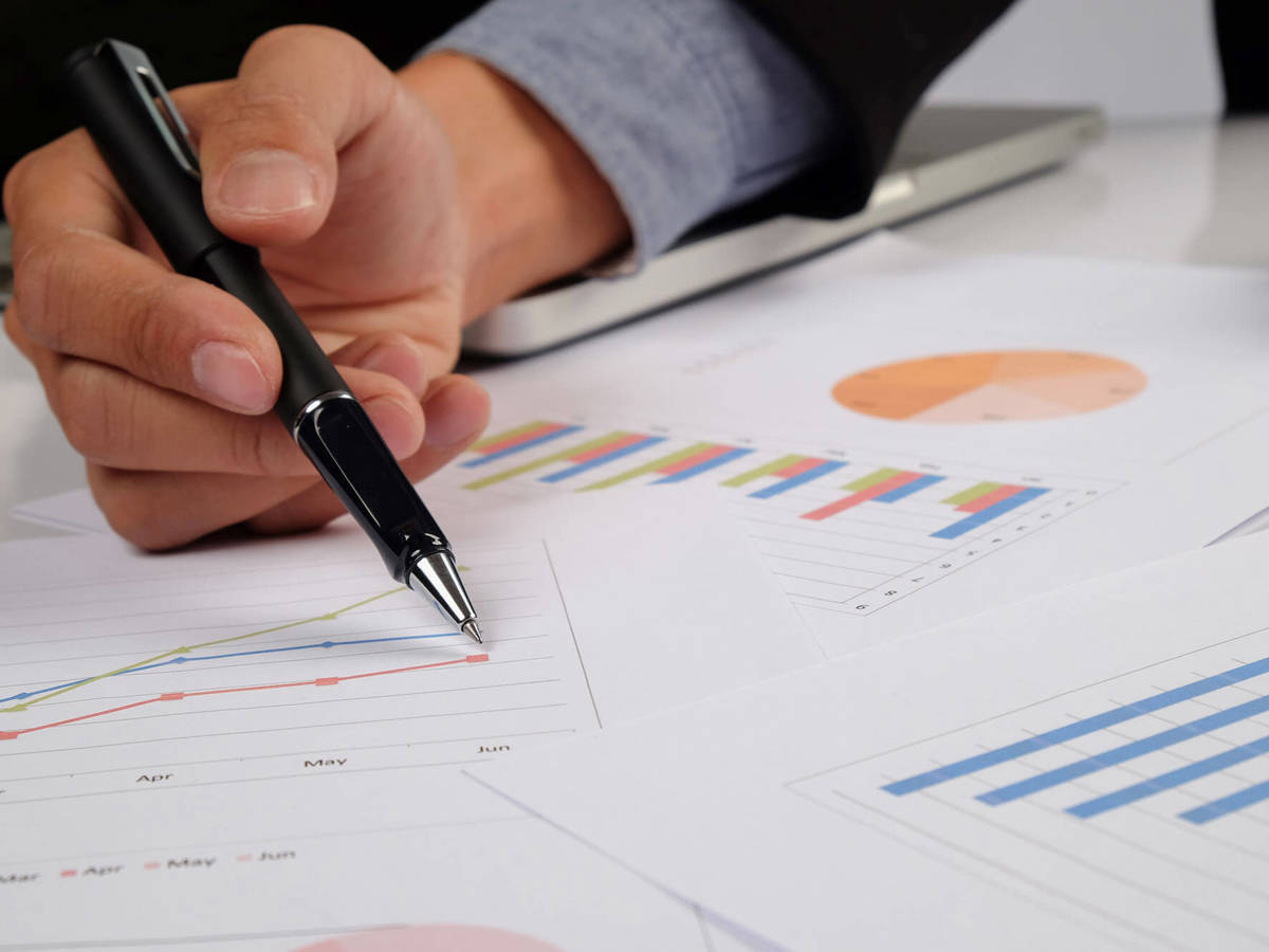 tools-resources someone analysing graphs and charts