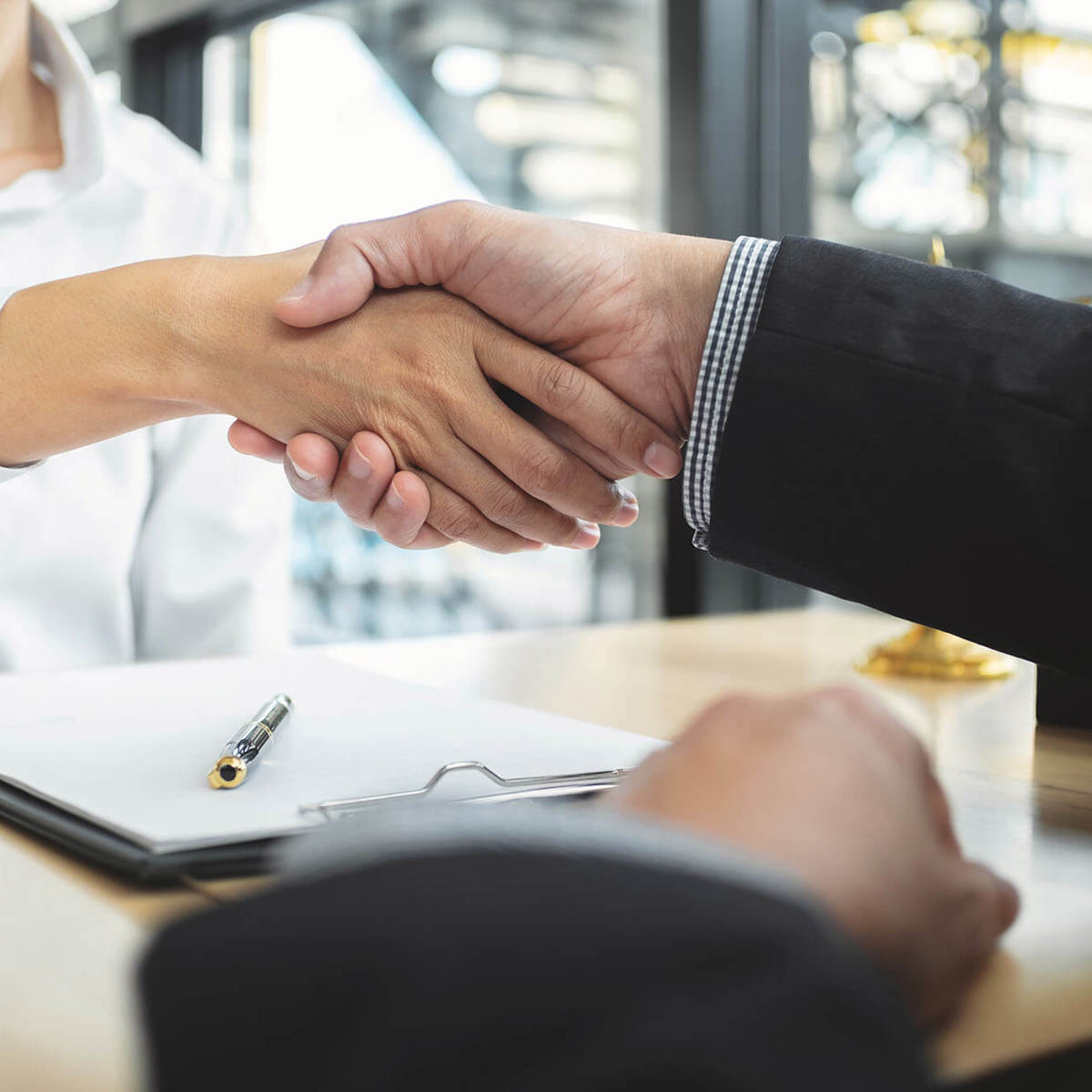 two people shaking hands