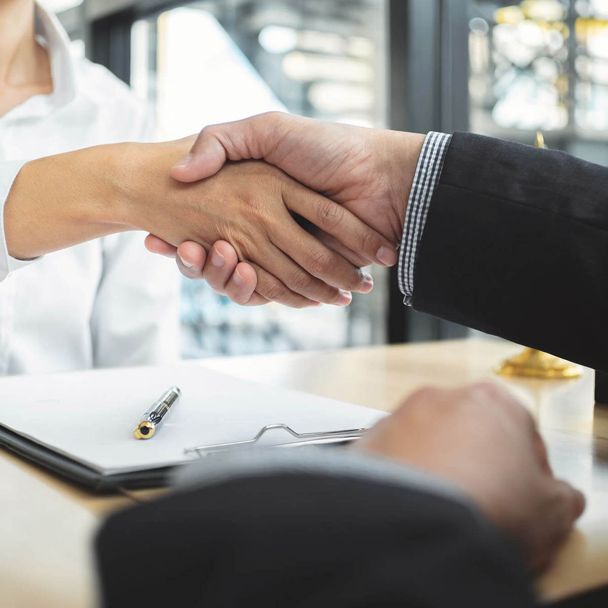 two people shaking hands
