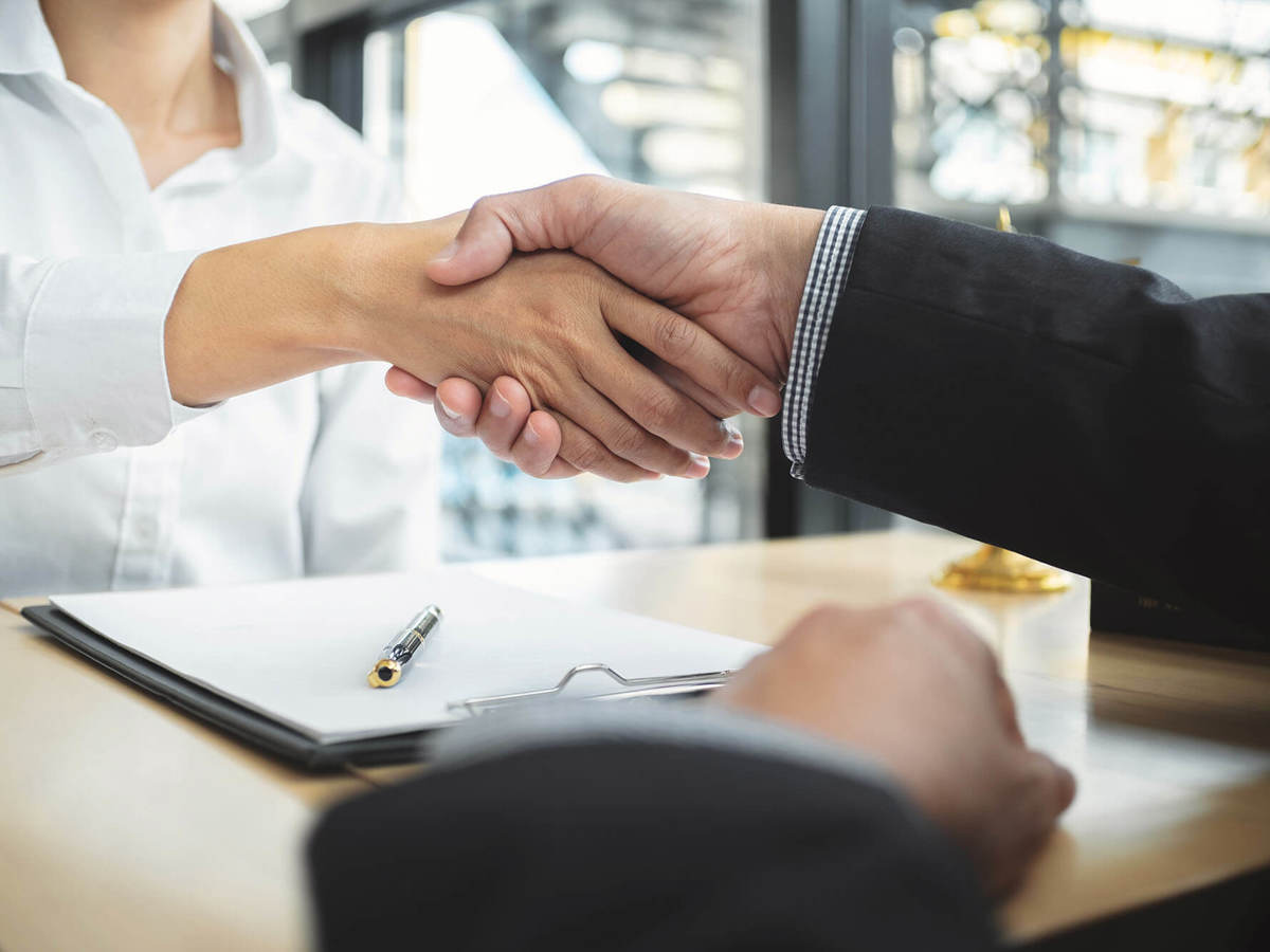 two people shaking hands