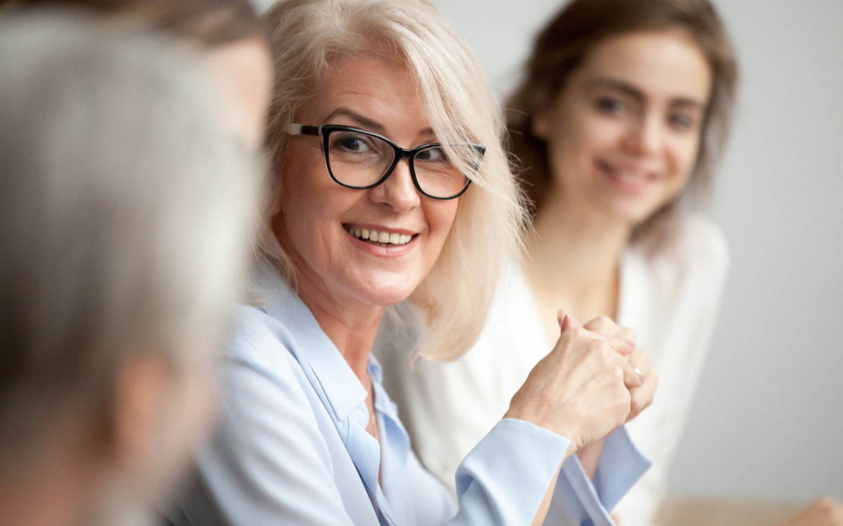 Lady smiling in meeting