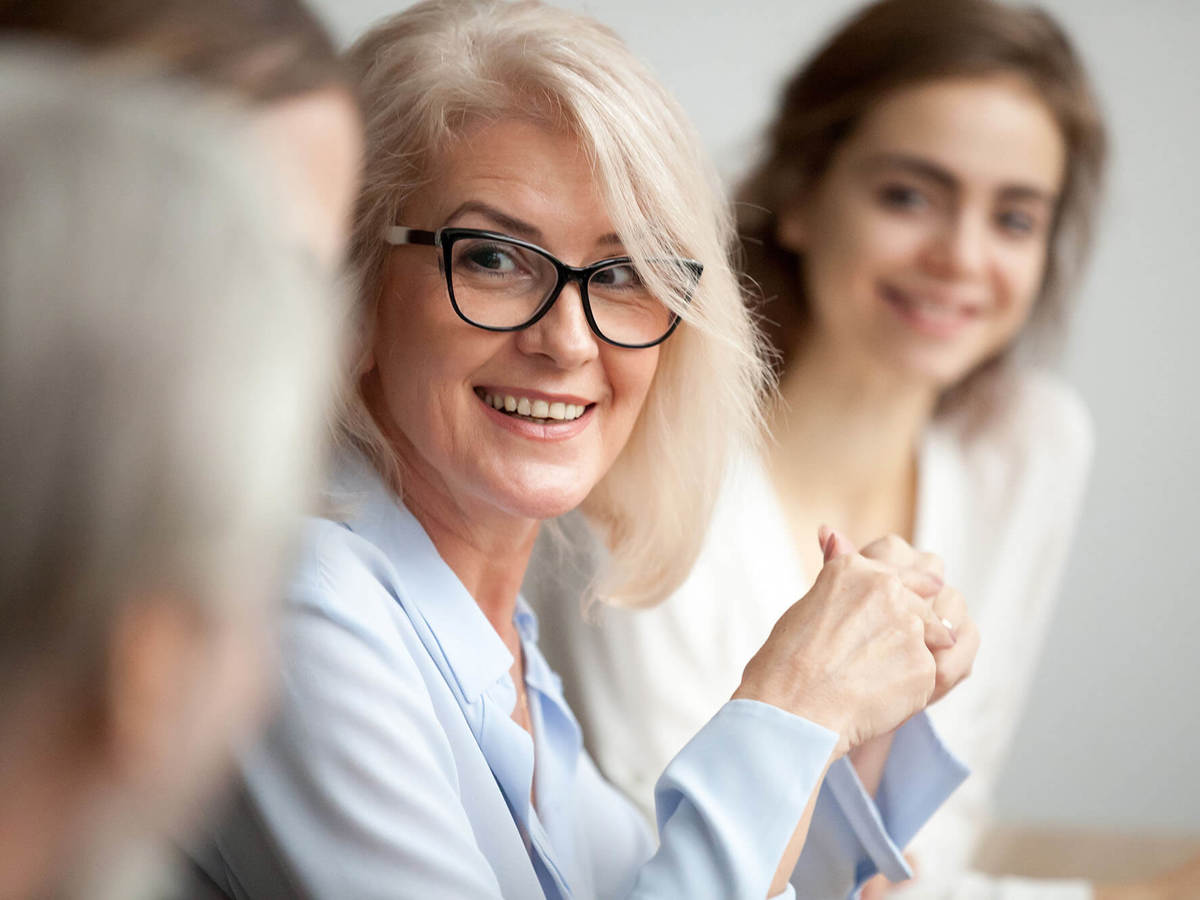 Lady smiling in meeting