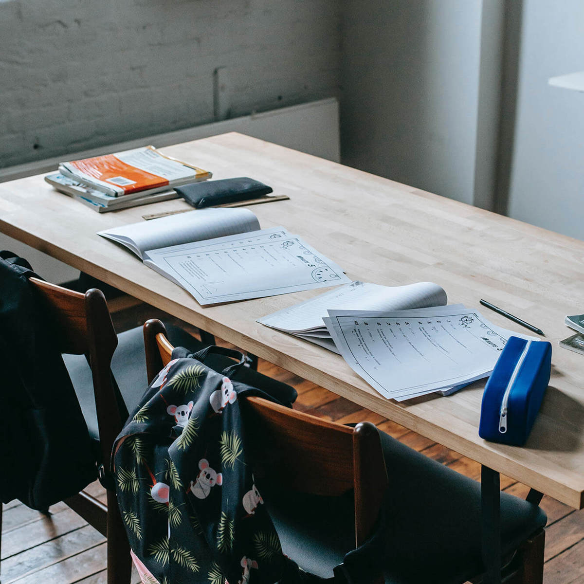 school-environment organised desk with bags and books