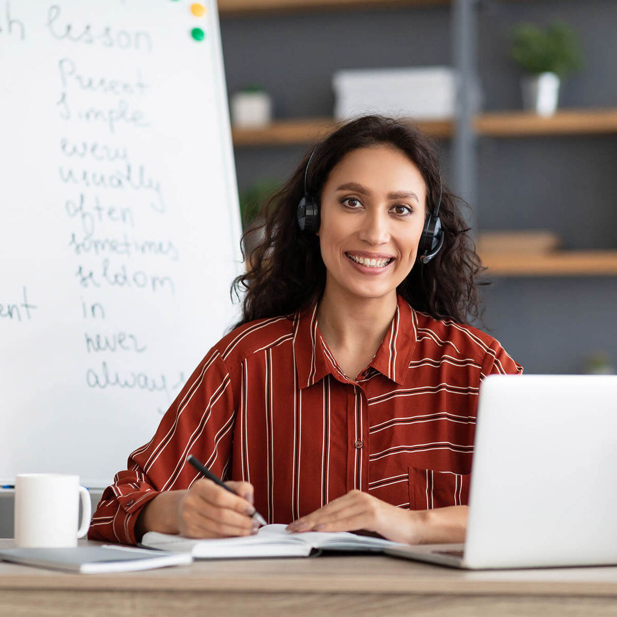 people woman writing notes smiling