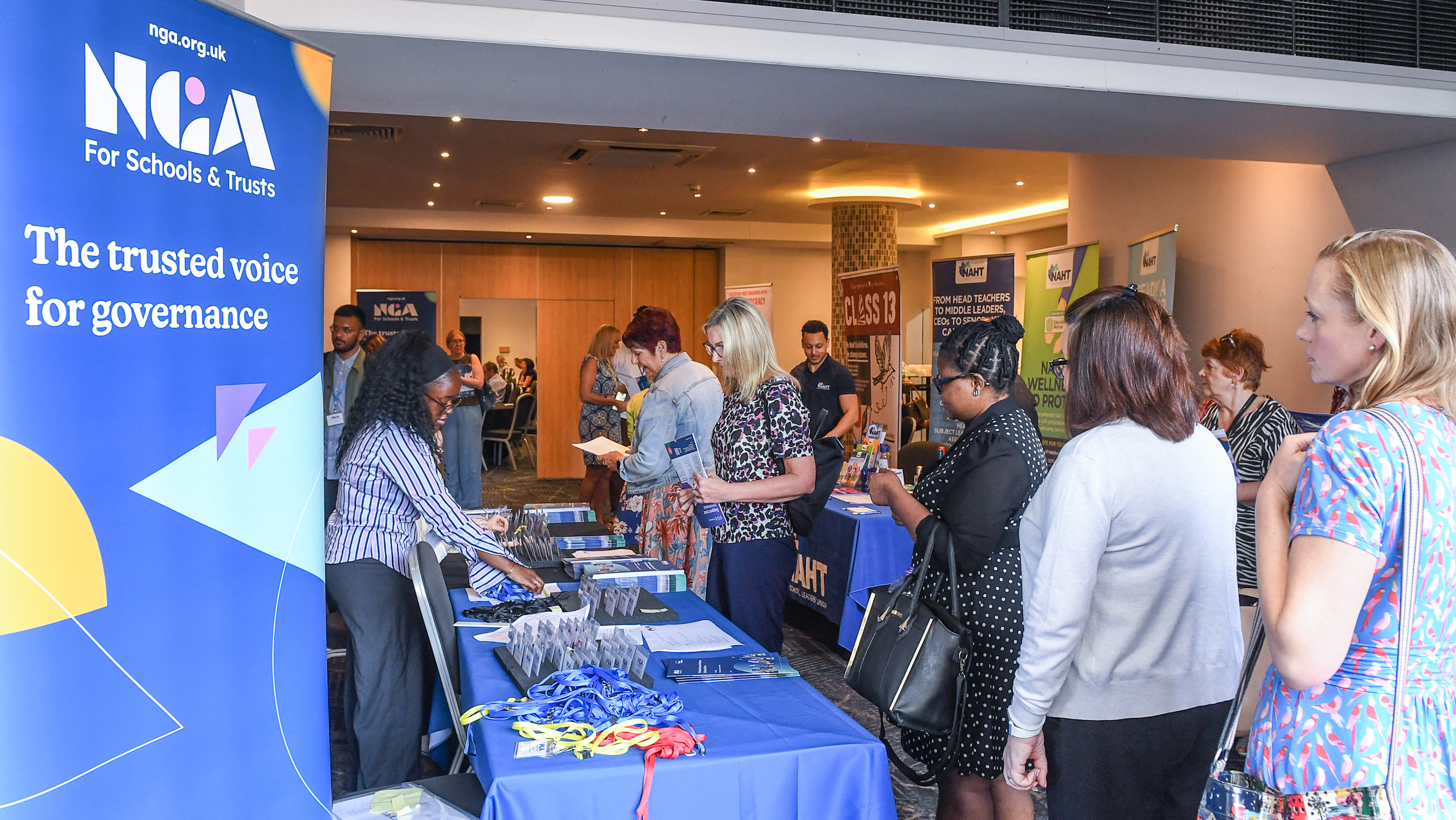 Delegates at conference exhibition space