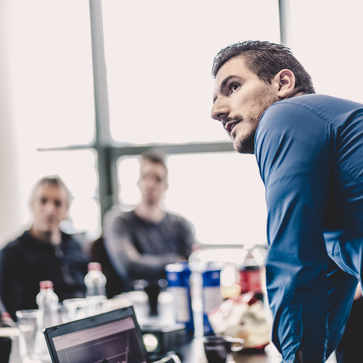 training people looking in same direction at table
