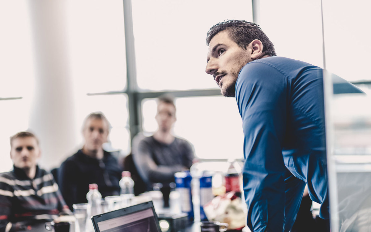 training people looking in same direction at table